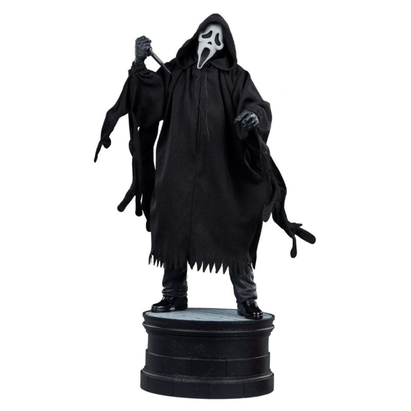 cloaked figure statue